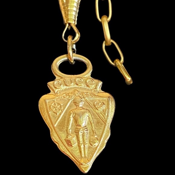 Gucci Jewelry - Authentic Vintage Gucci pendant on adjustable gold tone chain